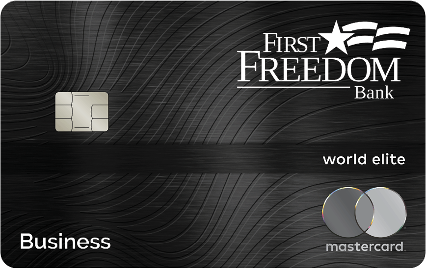 Image is of a silver Business Platinum Classic Credit Card from First Freedom Bank. 