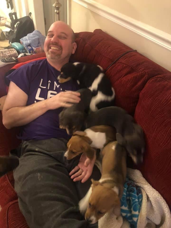 Bryan with foster puppies from A.A.R.F