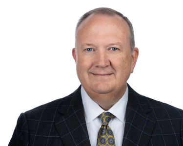 Image is of John Lancaster of First Freedom Bank.